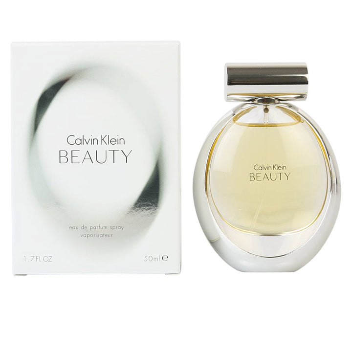Clear glass 100 ml perfume bottle with floral fragrance notes of jasmine and cedar for Women