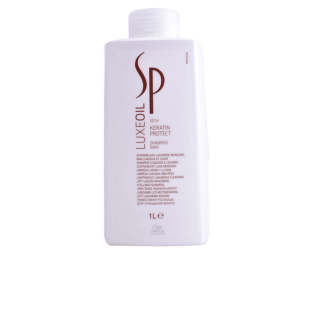 1,000 ml clear shampoo bottle with nourishing oil blend, Unisex daily use