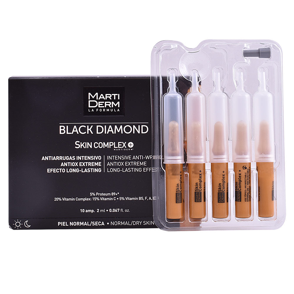 Small glass ampoule of clear serum labelled Skin Complex Advanced, 2 ml, Unisex
