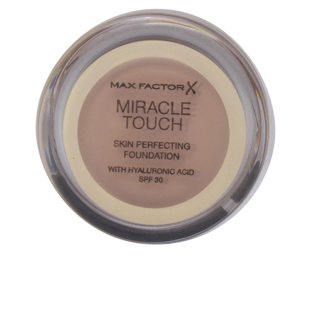 Compact solid-to-liquid foundation in Warm Almond, 12 g, SPF 30