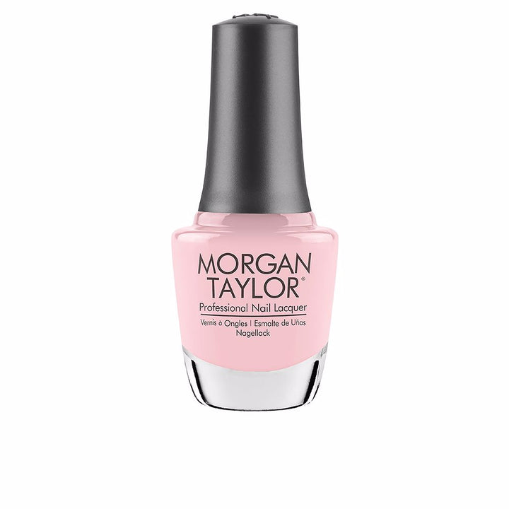 15 ml clear glass bottle of cream pink nail lacquer with curved brush