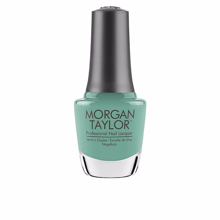 15 ml glass bottle of creme nail lacquer in coral‑pink shade, curved brush detail