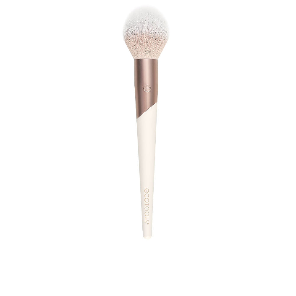 Dense vegan powder brush with tapered head and slender handle