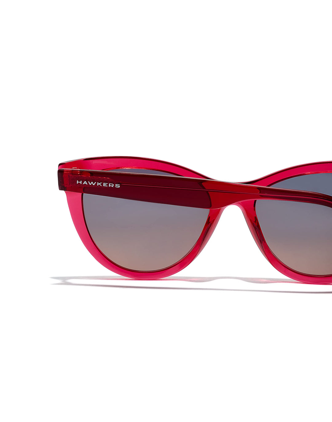 Unisex cat‑eye sunglasses in translucent cherry acetate with grey‑to‑pink gradient lenses
