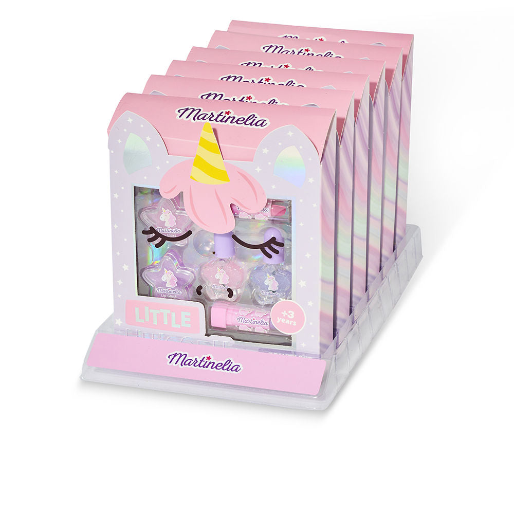Six-piece unicorn-themed glitter makeup kit with nail polishes and lip products