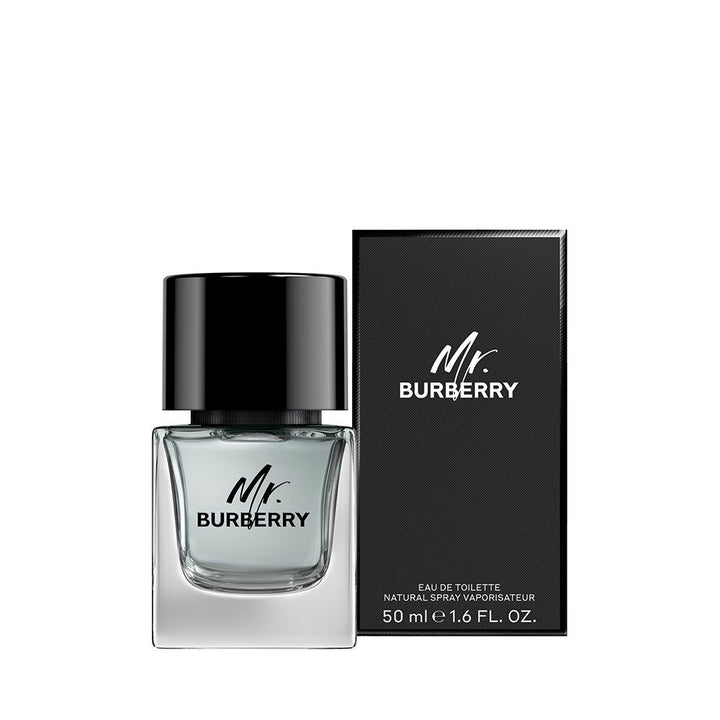 Transparent glass 50 ml eau de toilette with black cap and tie; aromatic woody notes