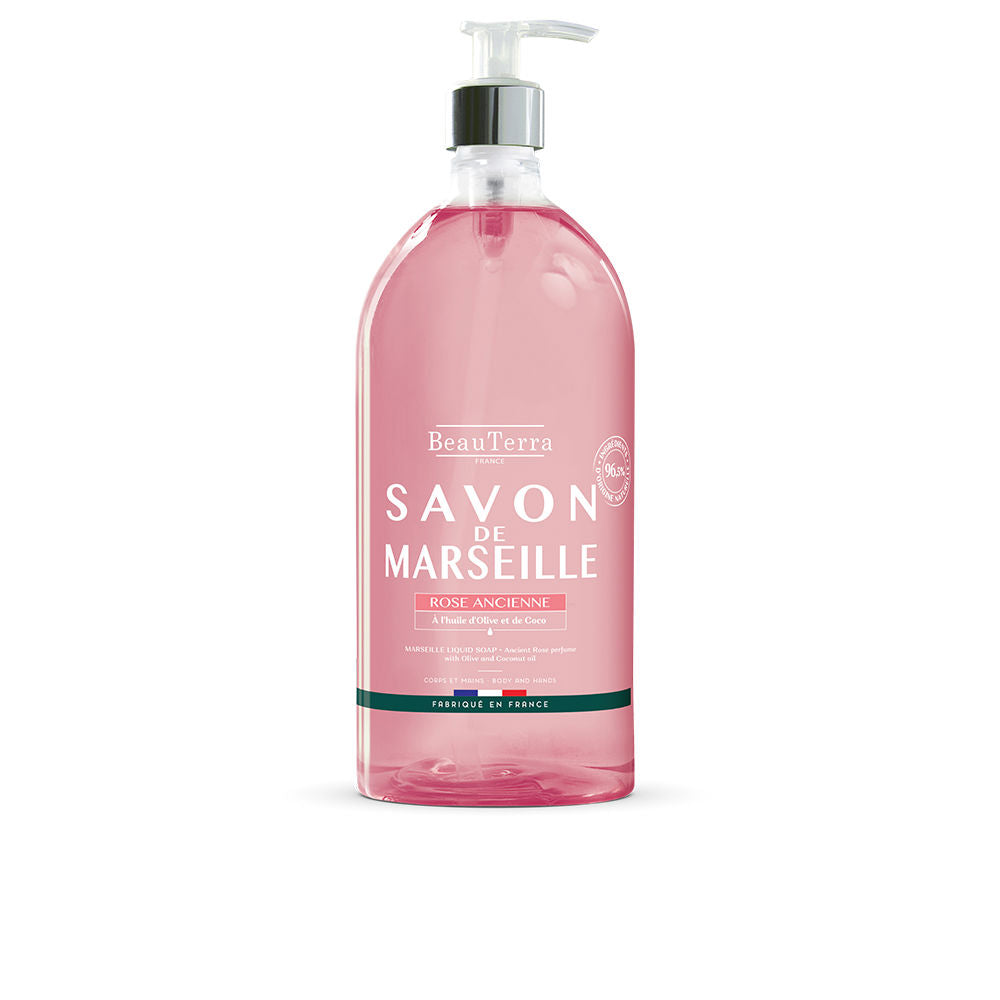 Tall 1 L pump bottle of pale pink liquid soap with olive and rose ingredients