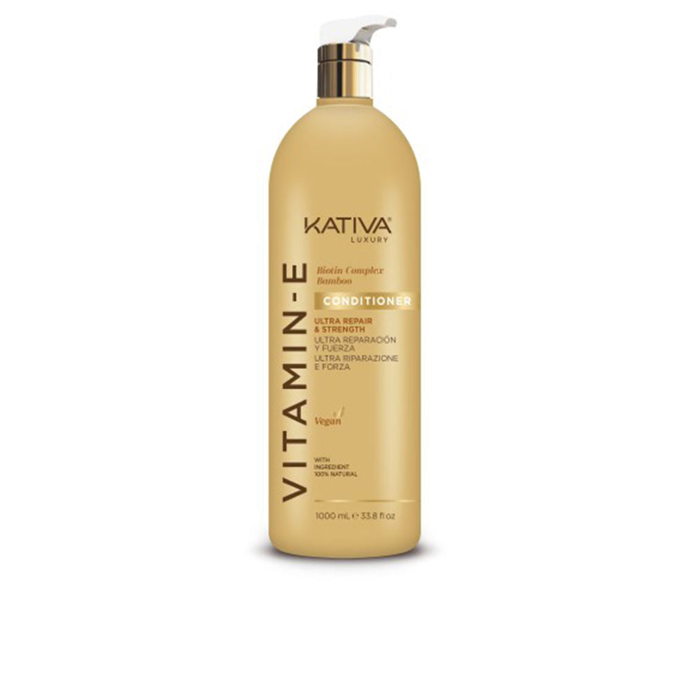 Large 1000 ml white conditioner bottle labelled Vitamin E & Biotin Repair