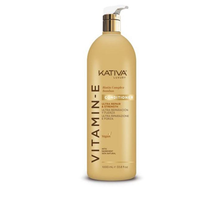 Large 1000 ml white conditioner bottle labelled Vitamin E &amp; Biotin Repair