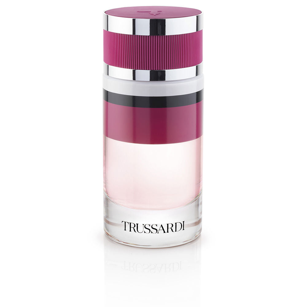 Glass perfume bottle with deep red liquid and silver cap, 90 ml
