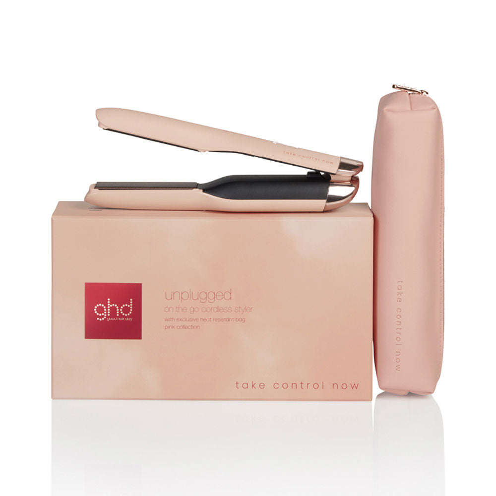 Peach‑coloured cordless hair styler with ceramic plates and heat pouch