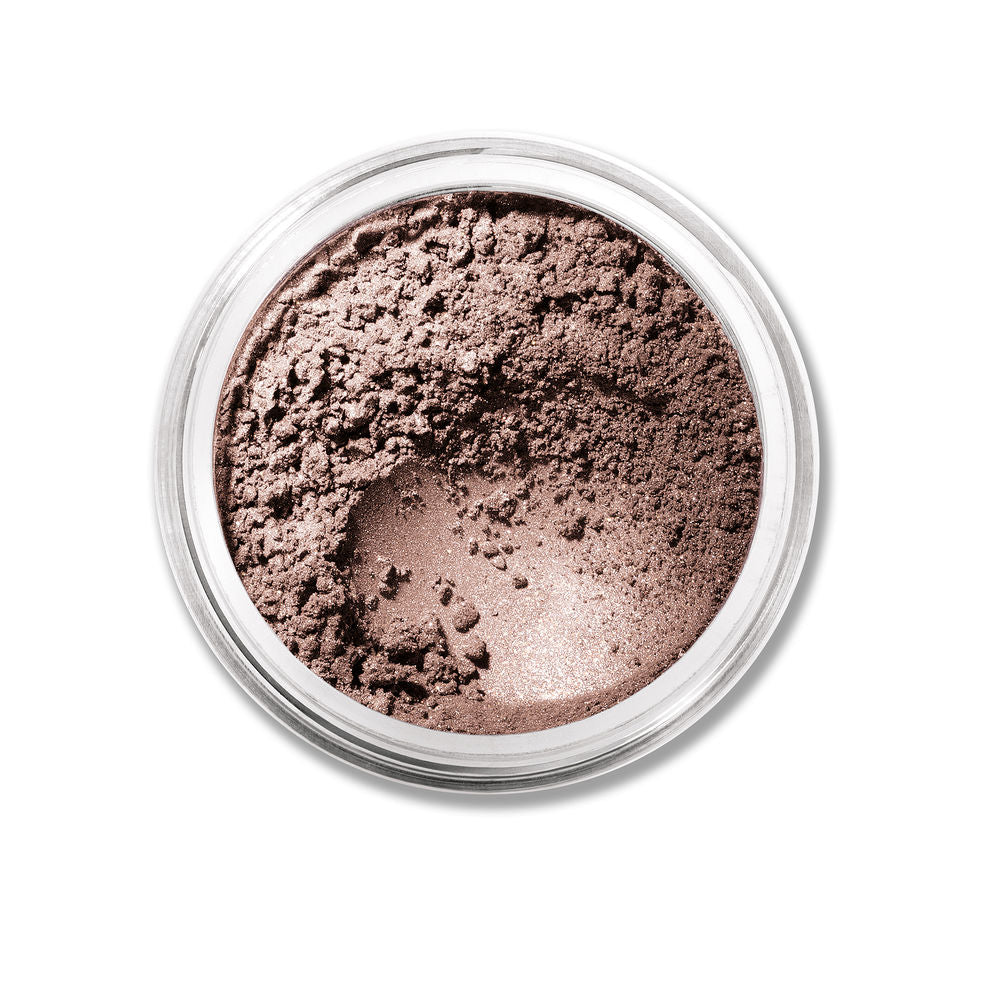 Loose mineral eyeshadow jar in Queen Tiffany, luminous blue-green shimmer