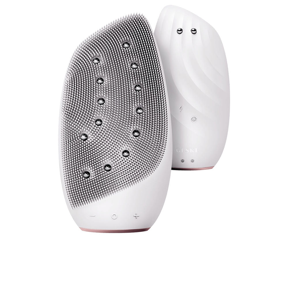 White 8-in-1 sonic thermo facial brush with warming pearls and interchangeable heads