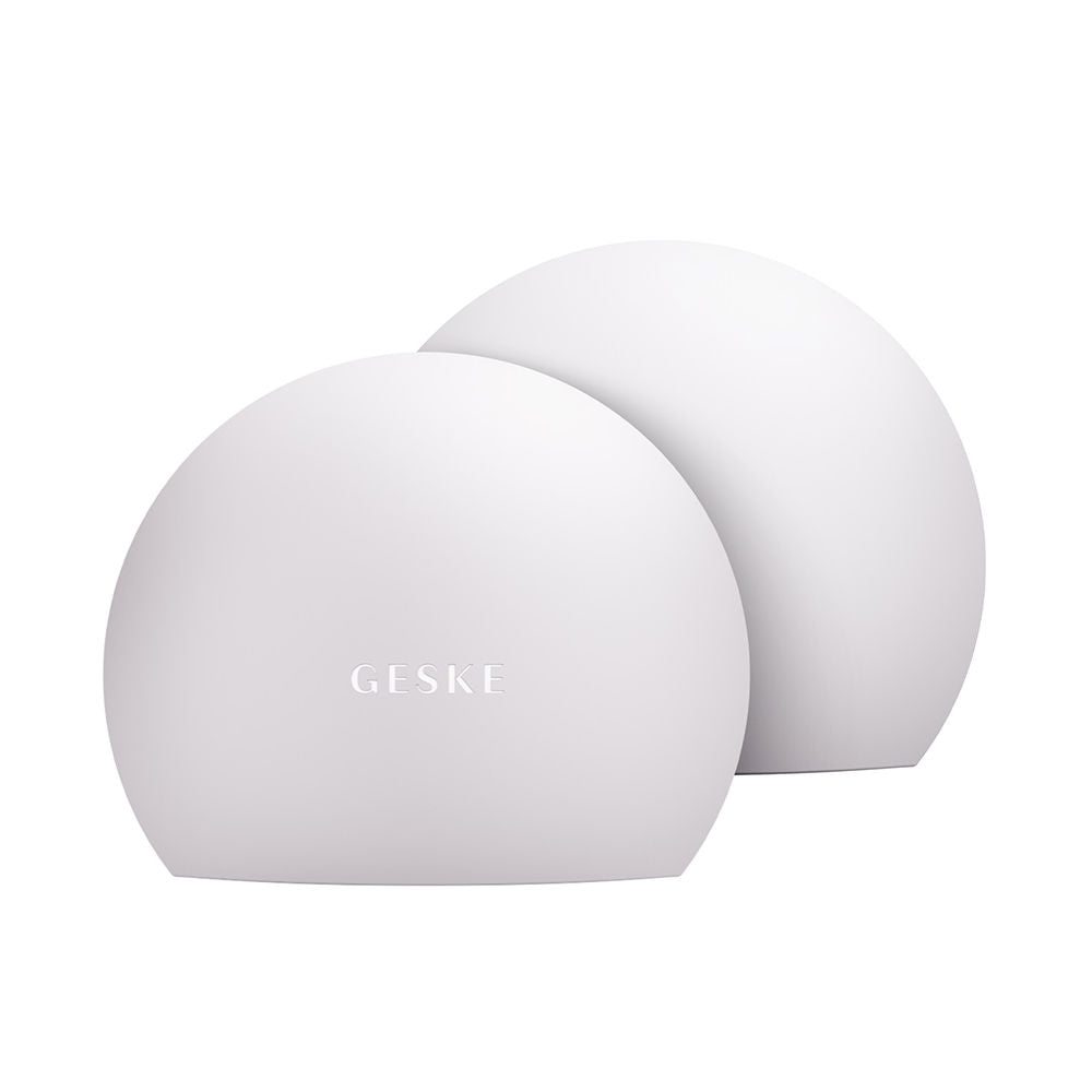 White compact 4‑in‑1 app‑guided lip volumiser device, travel size