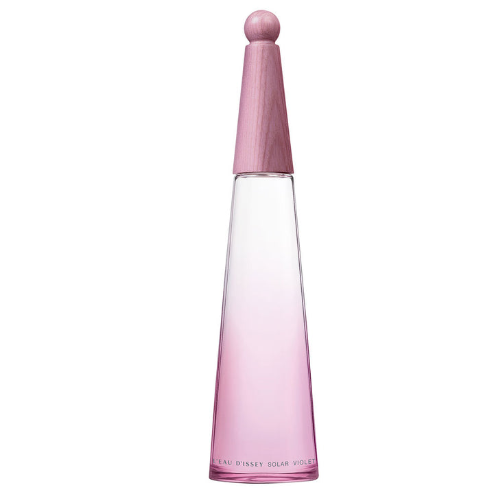 Issey Miyake Minimalist pink gradient glass perfume bottle with tapered silhouette and rounded wooden cap