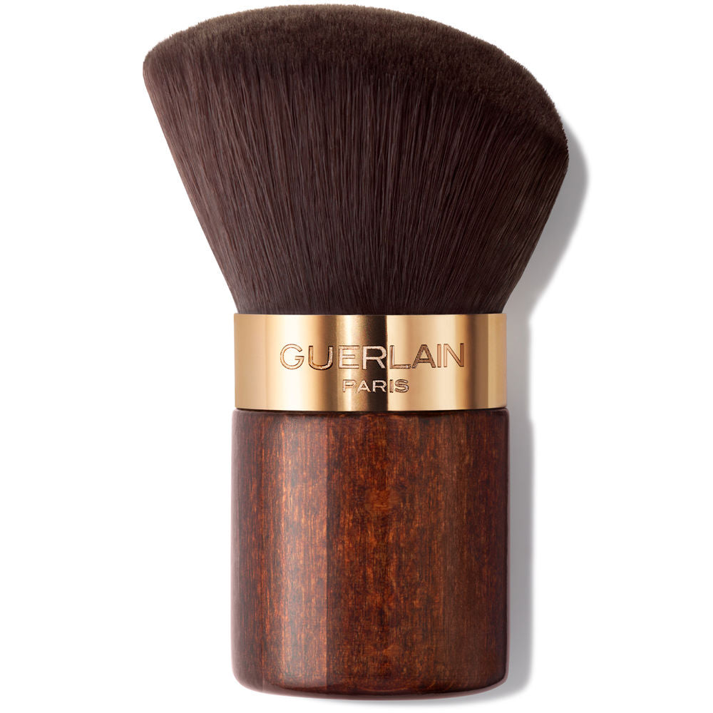 Guerlain Red and silver kabuki makeup brush with clear handle, synthetic soft bristles, short compact design