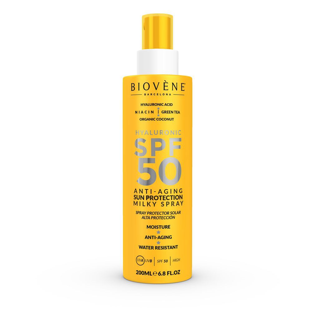 Biovène yellow plastic cylindrical sunscreen spray bottle with white and yellow cap, front text visible, spray nozzle