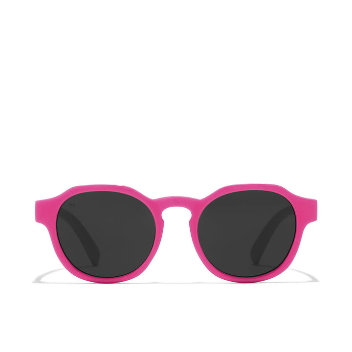 Hawkers Pink round sunglasses for kids with dark tinted lenses and slim temple arms