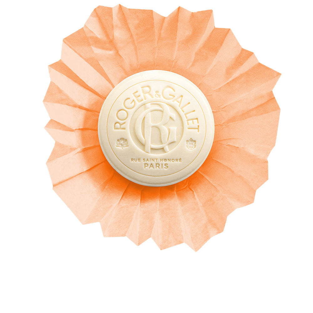 Roger &amp; Gallet Cream and peach round bar soap with embossed logo, pleated paper wrapper, classic timeless finish .