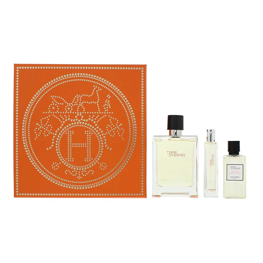 Clear glass cologne bottle with woody-citrus fragrance, travel-friendly format