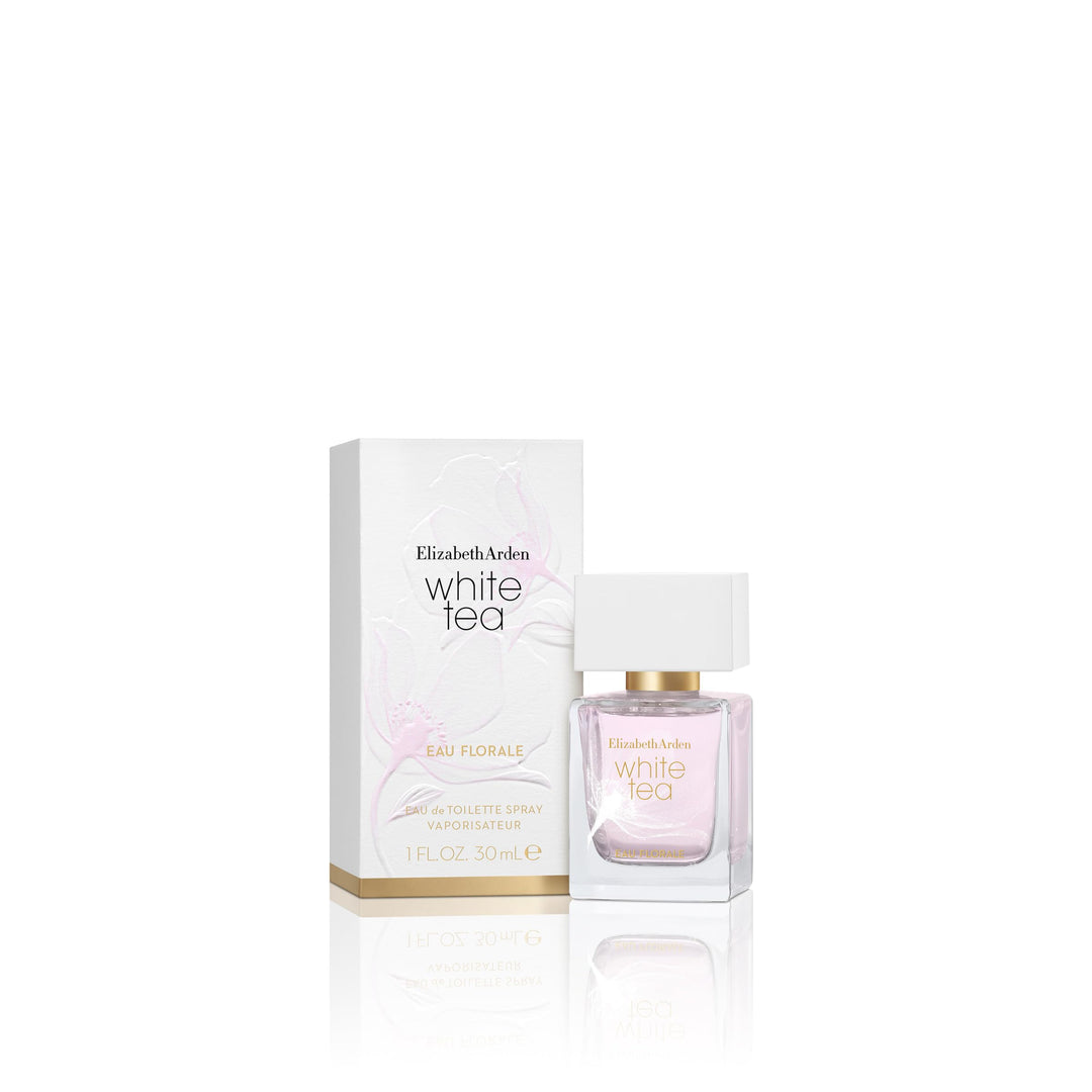 Clear slender bottle of pale rose eau de parfum with gold detailing, 30 ml