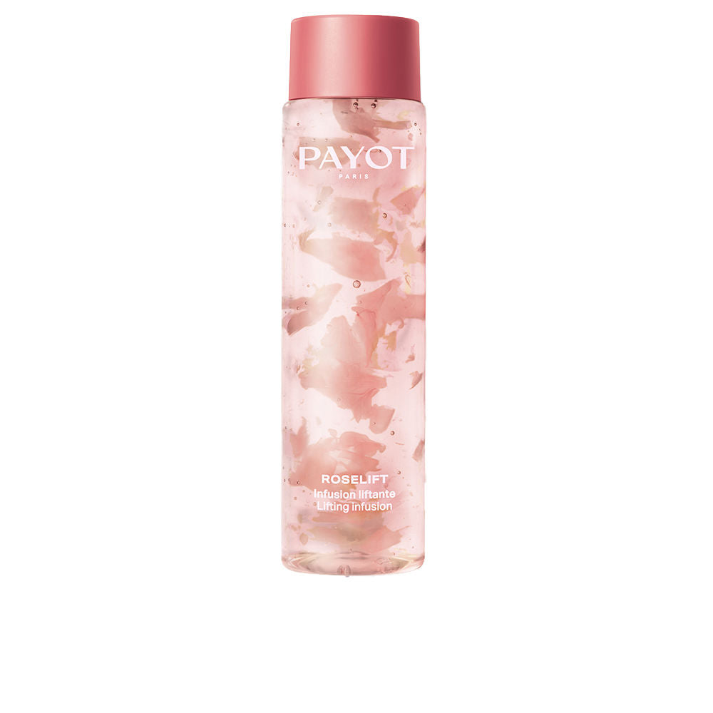 Payot transparent pink plastic bottle with suspended floral-like particles, modern minimalistic design