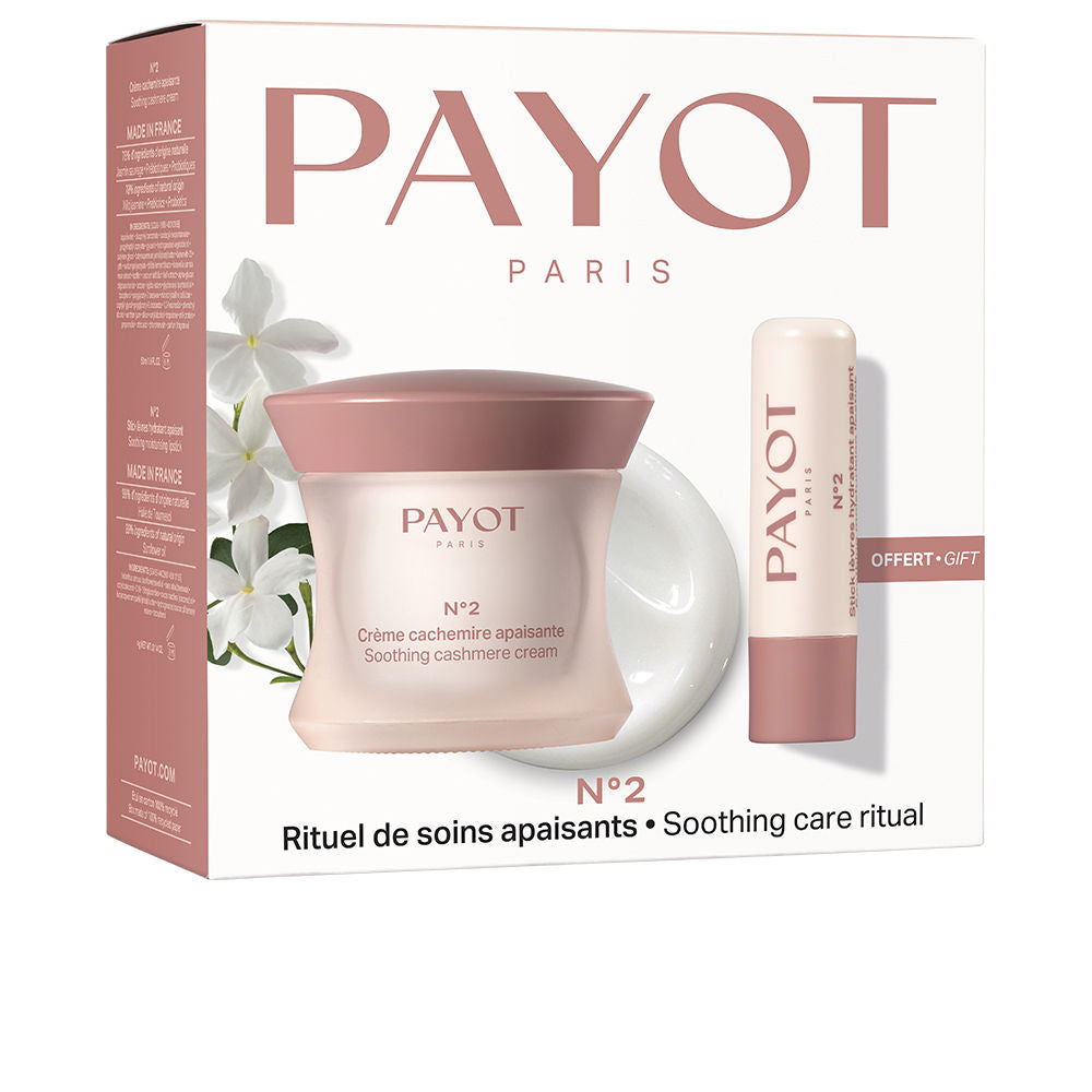 Soft pink and white plastic jar and matching lip balm stick, minimalist design with flower motif, Payot