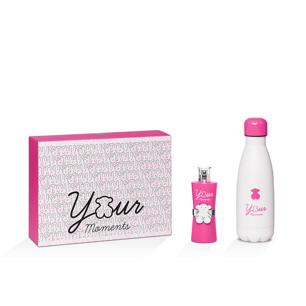 Fuchsia cylindrical perfume bottle with silver ring and bear emblem, includes eau de toilette