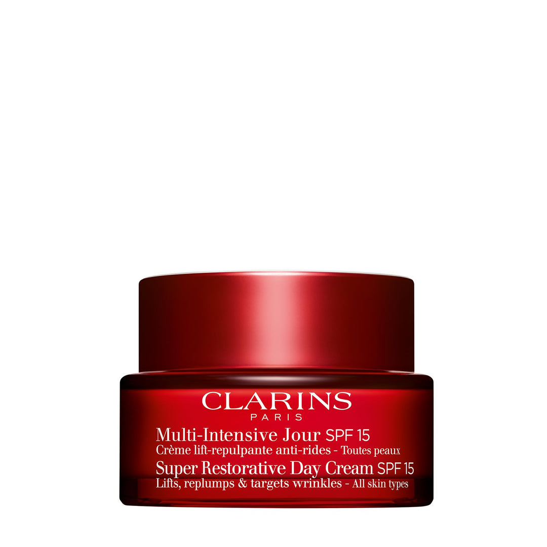 Clarins jar of day cream with SPF 15, pale ivory cream in frosted glass jar with screw lid