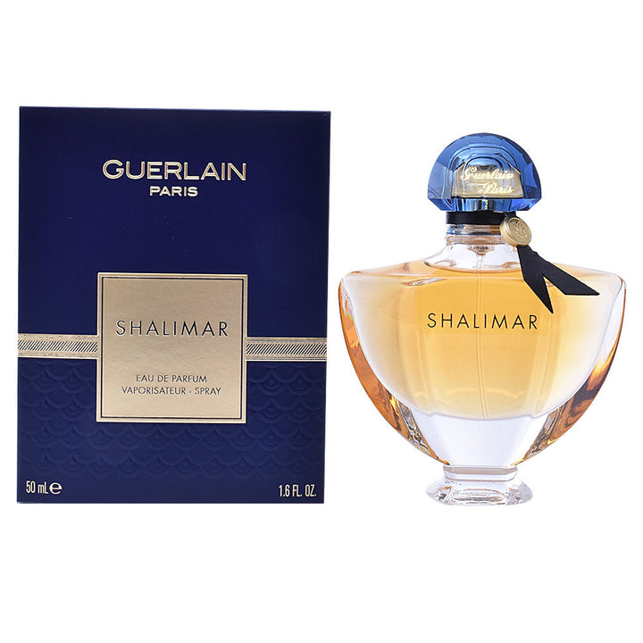 30 ml fluted glass perfume bottle with fan-shaped cap, amber liquid