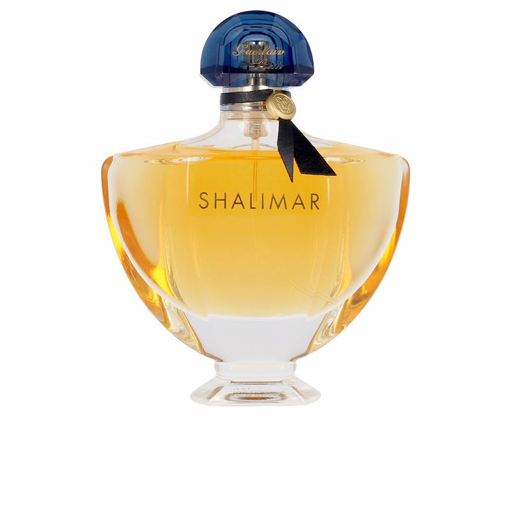 30 ml fluted glass perfume bottle with fan-shaped cap, amber liquid