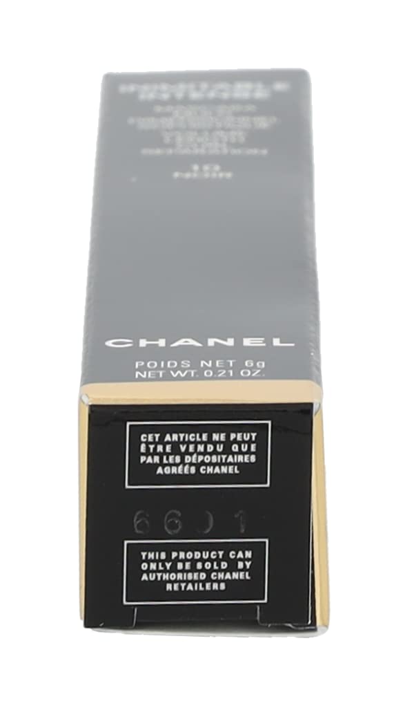Black rectangular tube with silver middle band and smooth surface, wand beside tube, brand Chanel