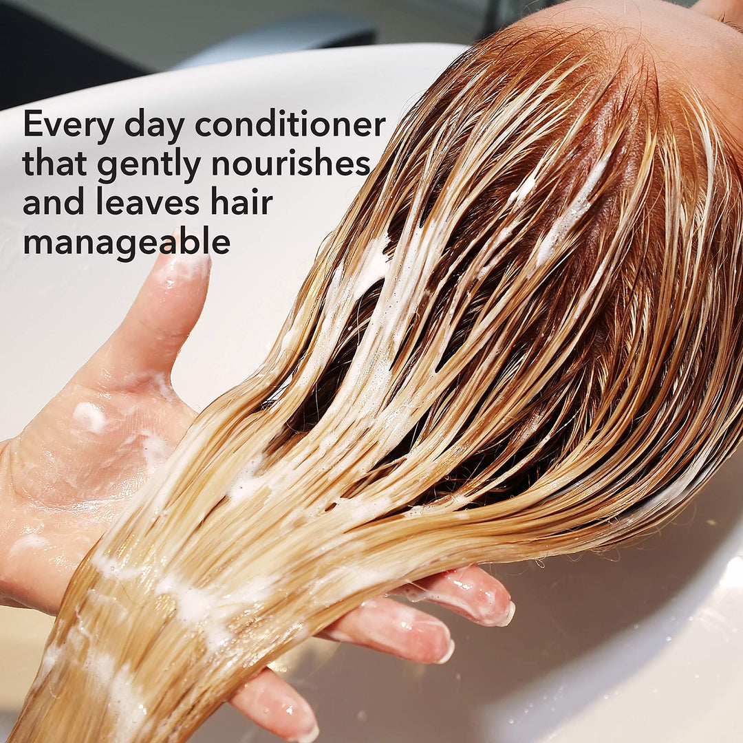 1000 ml pump bottle of hydrating conditioner with macadamia and argan oils