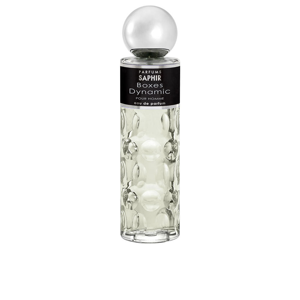 Parfums Saphir Round textured glass eau de parfum bottle with large spherical cap, black label, clear liquid visible.