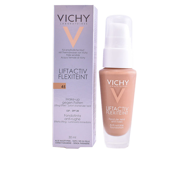 Vichy Light purple and beige foundation bottle with pump beside cardboard box, modern minimalist presentation
