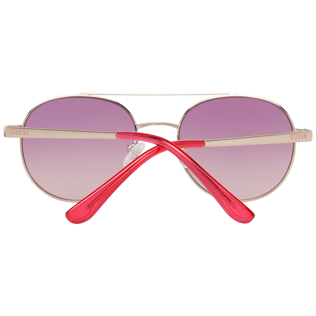 Gold metal aviator sunglasses with pink gradient lenses and double bridge on white background