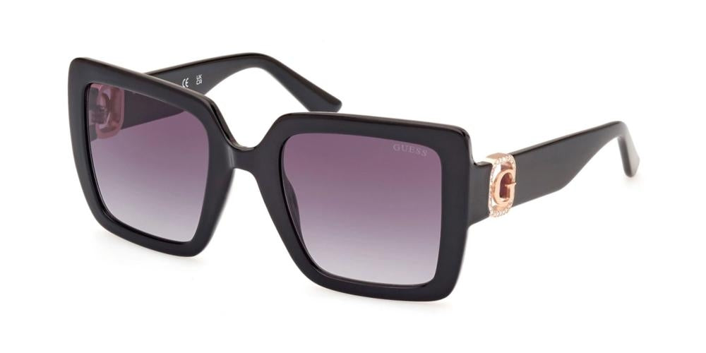 Black oversized square sunglasses with purple gradient lenses and gold G emblem on temples
