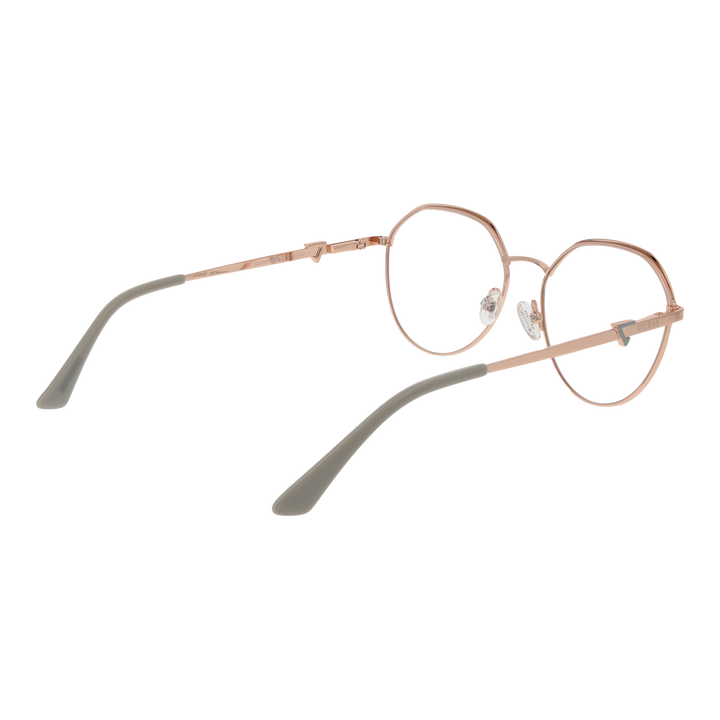 Rose gold thin metal round eyeglasses on beige background, adjustable nose pads, modern minimalist frame
