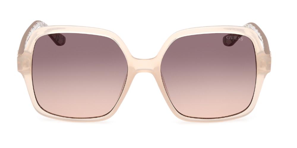Beige oversized square sunglasses with gradient brown lenses and logo temples on a neutral background
