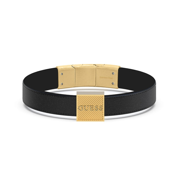 Black leather bracelet with gold textured square buckle and stainless steel clasp on neutral background