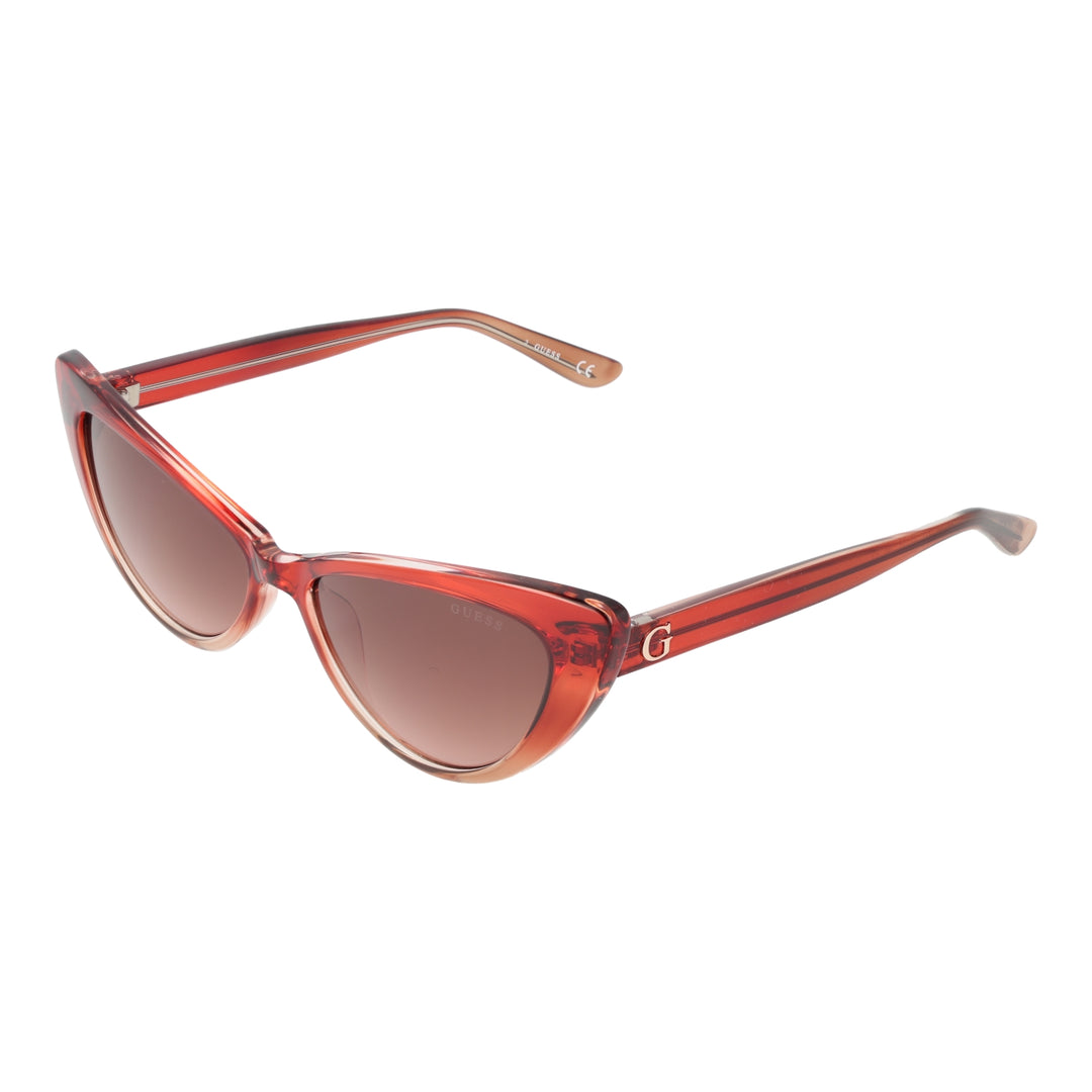 Transparent red cat-eye sunglasses in plastic with gradient lenses shown at three-quarter angle